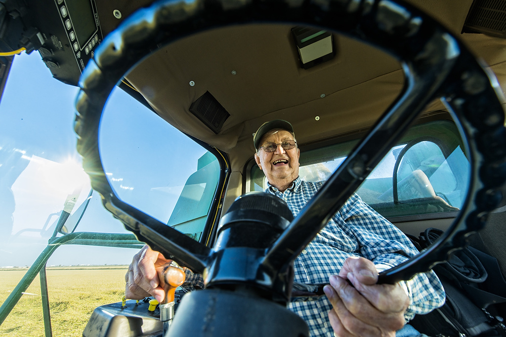 Don Rystrom driving rice harvester